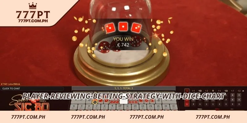 Player reviewing betting strategy with dice chart